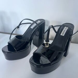 Steve Madden platform black shoes.